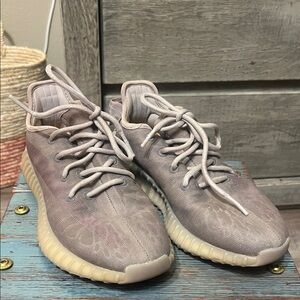 Yeezy Boost athletic shoes. Like new.
